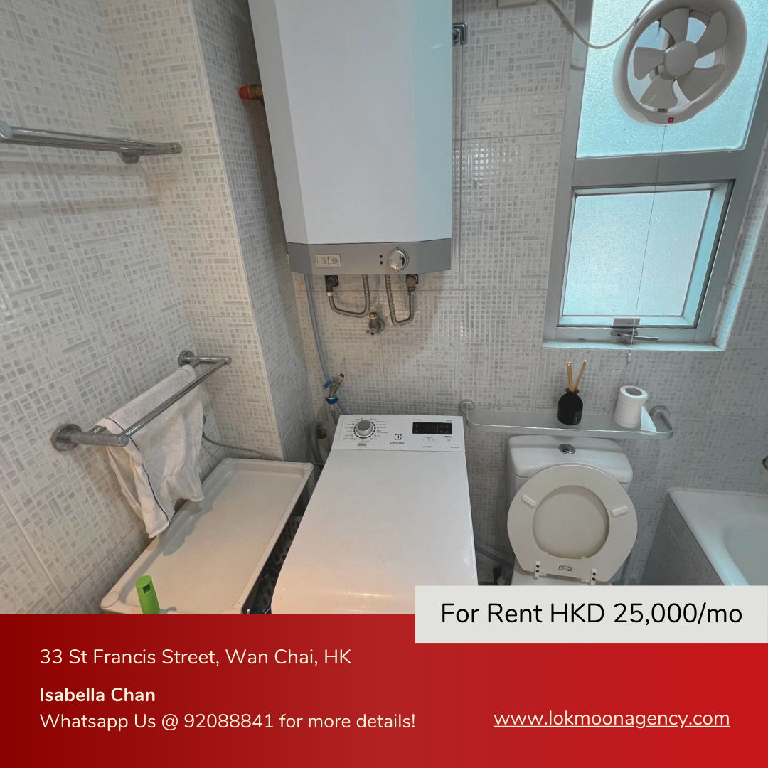 Modern bathroom with toilet, washing machine