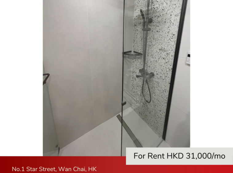 Spacious walk-in shower with rainfall showerhead and modern design