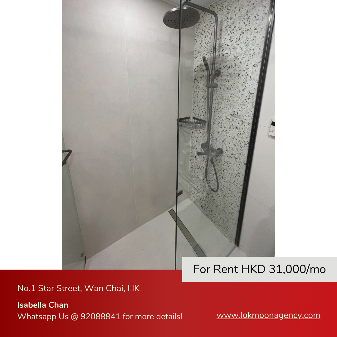 Spacious walk-in shower with rainfall showerhead and modern design