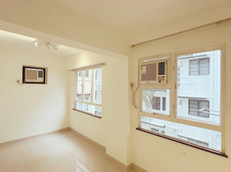 Wan Chai bedroom — one‑bed room with two ACs