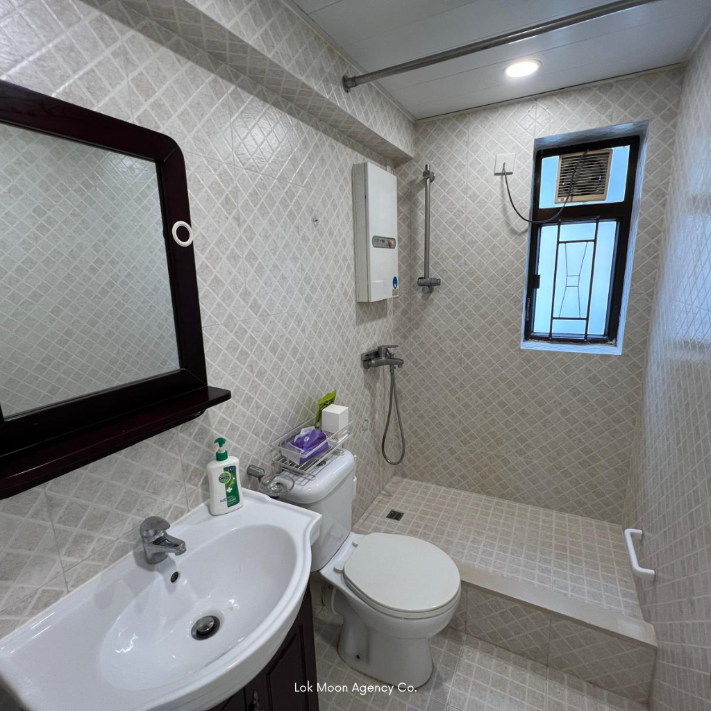 Wan Chai apartment bathroom — modern walk‑in shower with ventilation window