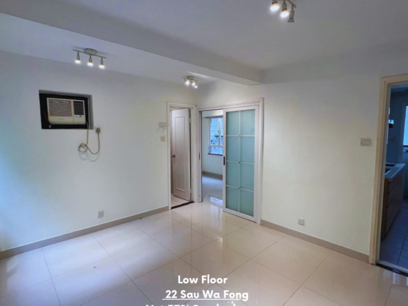 Wan Chai 1‑bed living room — bright windows